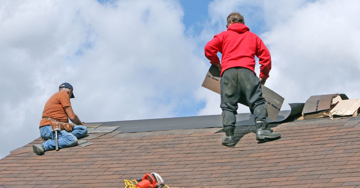 Contractors replacing roof